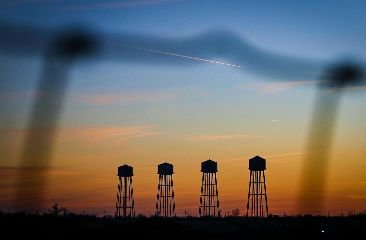 Four iconic water towers remain standing at the site of the former Sunflower Army Ammunition Plant in De Soto. Panasonic, which broke ground in November, will build a new lithium-ion battery manufacturing facility on the site.