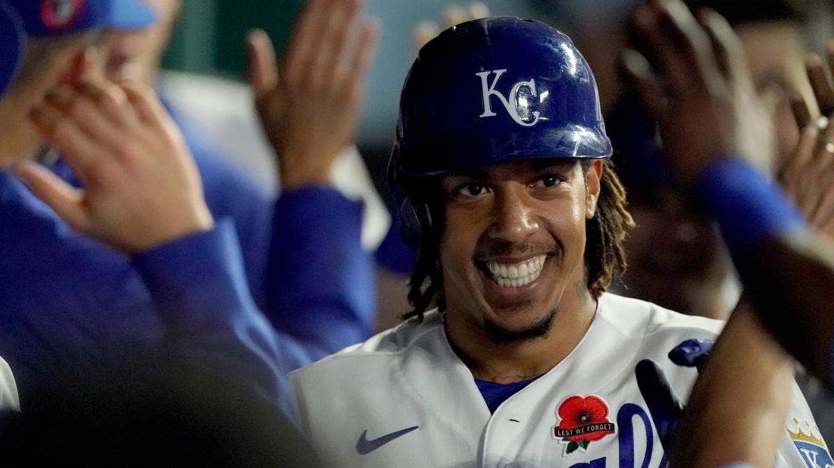 Kansas City Royals’ Adalberto Mondesi celebrates in the dugout after hitting a two-run home run during the fifth inning of a baseball game against the Pittsburgh Pirates Monday, May 31, 2021, in Kansas City, Mo. (AP Photo/Charlie Riedel)