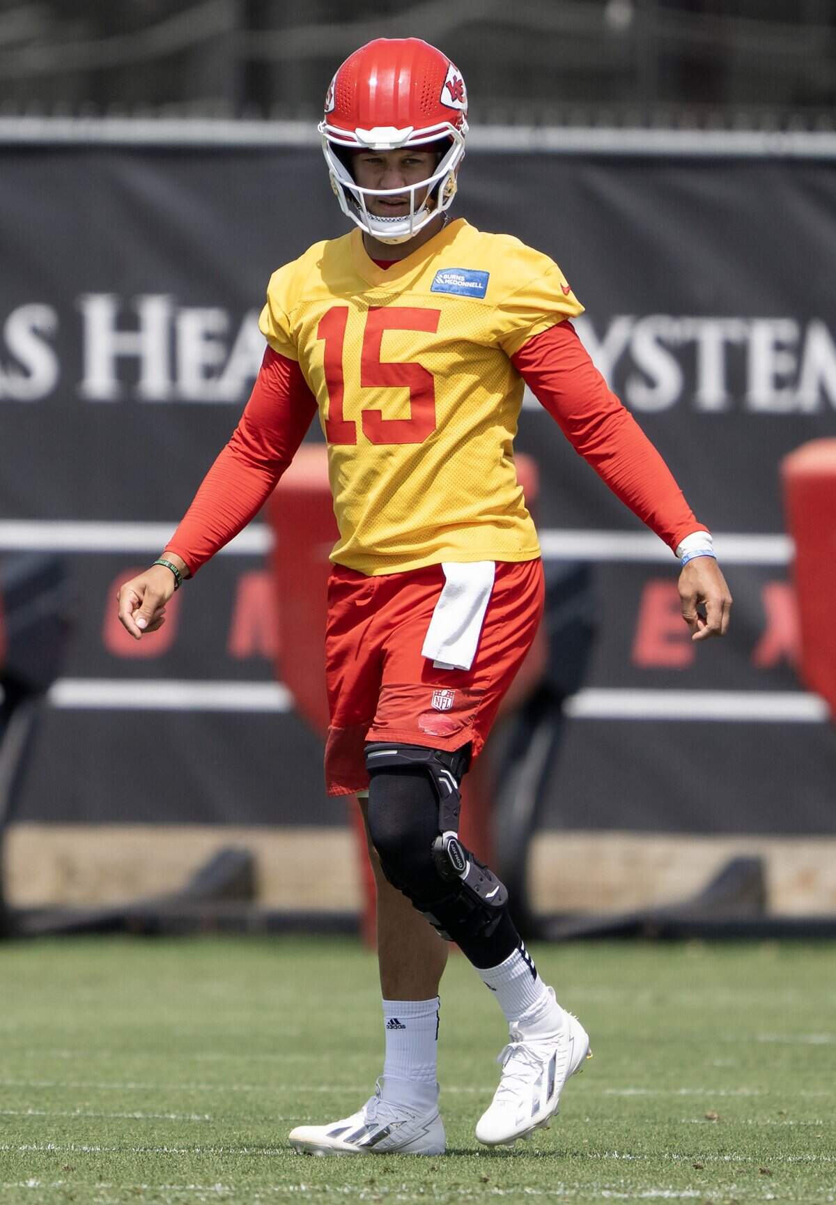 Kansas City Chiefs quarterback Patrick Mahomes (15) warms up while wearing a brace during minicamp practice at the Chiefs' practice facility on Wednesday, June 10, 2026, in Kansas City.