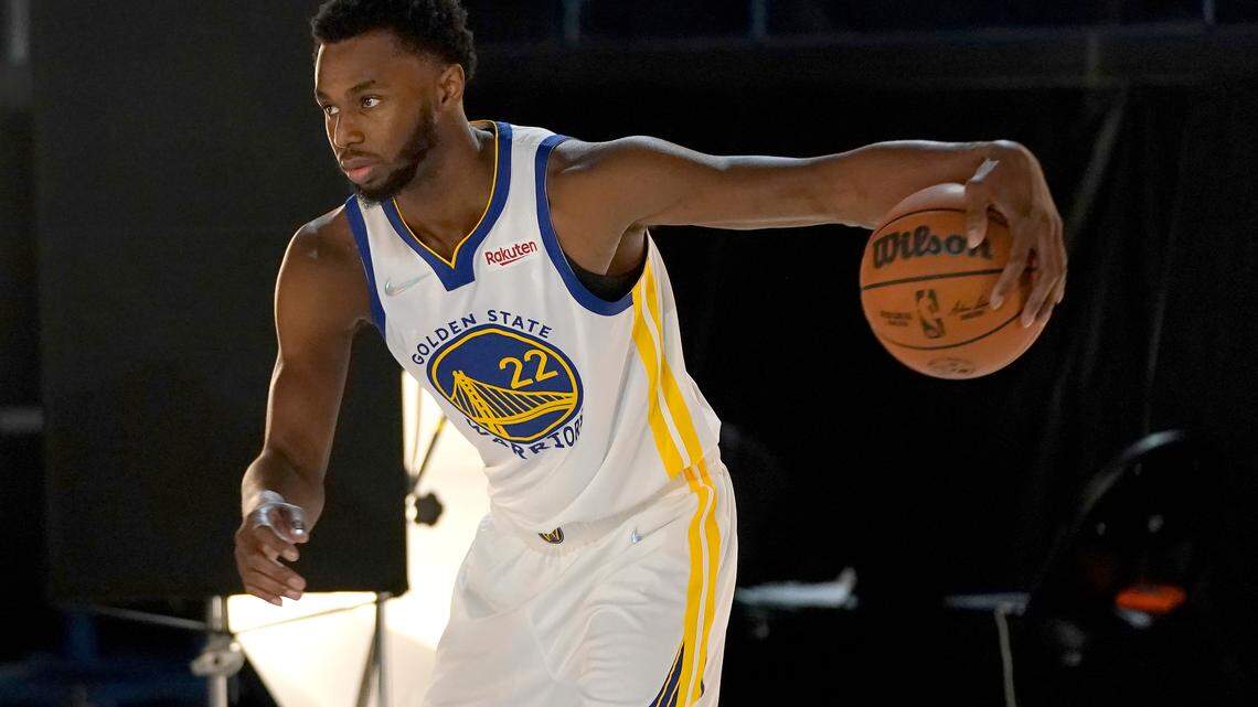 Golden State Warriors forward Andrew Wiggins poses for photos during the NBA basketball team’s media day in San Francisco, Monday, Sept. 27, 2021. (AP Photo/Jeff Chiu)