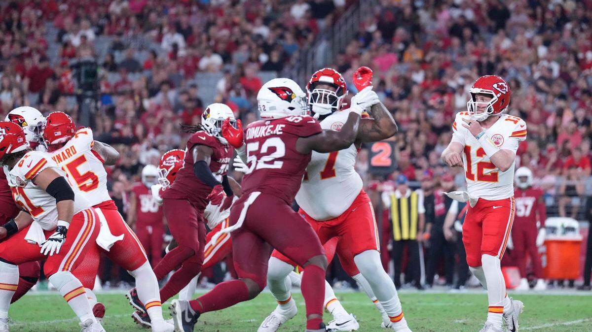 Aug 19, 2023; Glendale, Arizona, USA; Kansas City Chiefs quarterback Shane Buechele (12) throws a pass against the Arizona Cardinals during the first half at State Farm Stadium. Mandatory Credit: Joe Camporeale-USA TODAY Sports