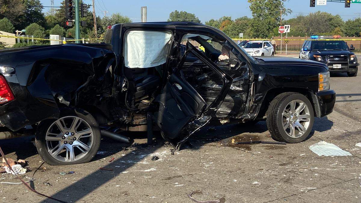 A toddler in a black pickup truck died after a crash involving a school bus, officials say.