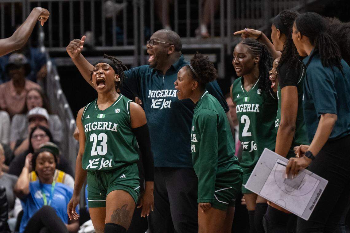 Nigeria’s Ezinne Kalu celebrates with the bench after making a 3-point shot in the first half of a WNBA preseason game on Monday, April 27, 2026, at T-Mobile Center.