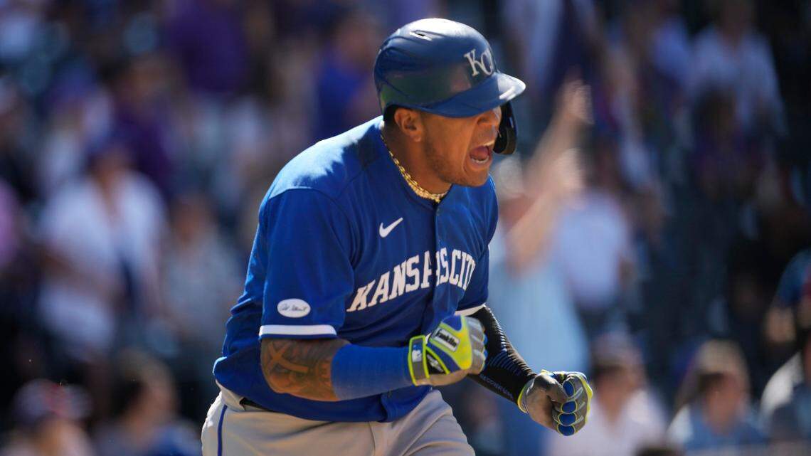 Kansas City Royals’ Salvador Perez reacts as he heads up the first base line after connecting for a single to drive in two runs off Colorado Rockies relief pitcher Daniel Bard in the ninth inning of a baseball game Sunday, May 15, 2022, in Denver. (AP Photo/David Zalubowski)
