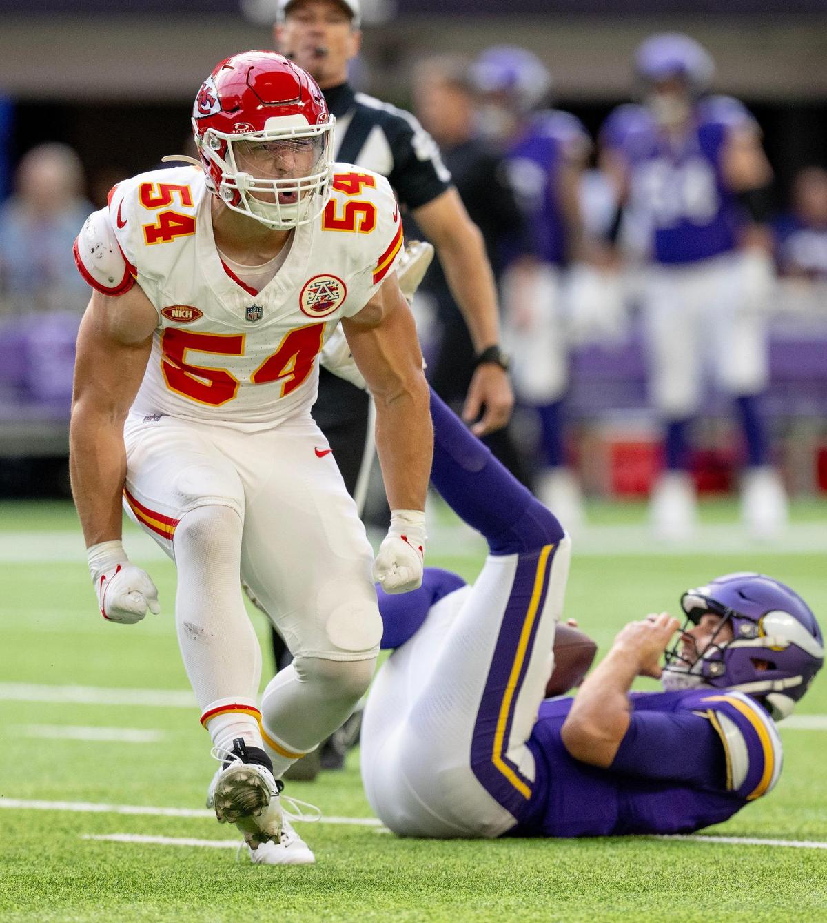Kansas City Chiefs linebacker Leo Chenal (54) celebrates after sacking Minnesota Vikings quarterback Kirk Cousins (8) during an NFL football game on Sunday, Oct. 8, 2023, at U.S. Bank Stadium in Minneapolis, Minn.