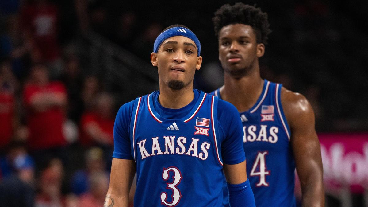 Kansas Jayhawks guard Dajuan Harris Jr. and forward KJ Adams walk downcourt late in the second half of the Jayhawks’ Big 12 Championship quarterfinal loss vs. the Arizona Wildcats on Thursday, March 13, 2025 at T-Mobile Center.