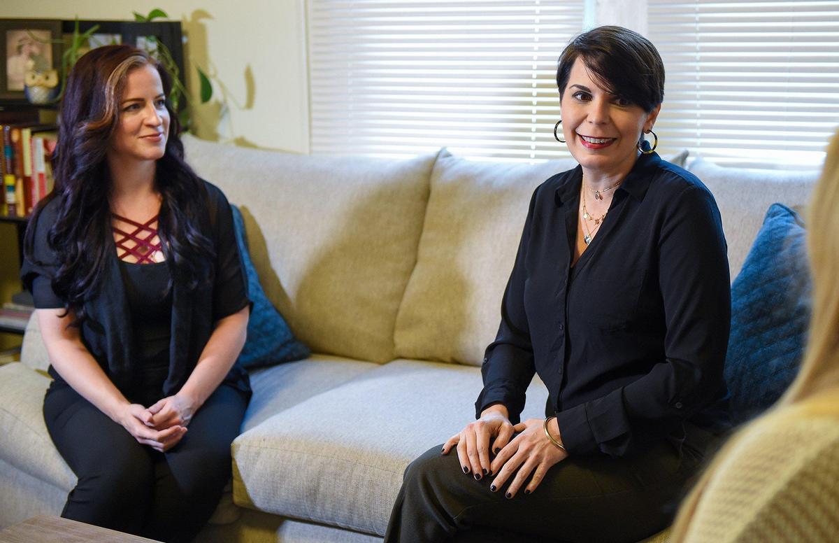 Survivors of domestic violence, Shannon Joy, left, and Janice Thompson, speak with another survivor of domestic violence during a recent visit to Joy’s home in Springfield, Missouri. Springfield consistently has the highest rate of domestic violence incidents in Missouri. Thompson is now an advocate for victims of domestic violence, while Joy is a business woman and a painter. Joy and Thompson each survived brutal attacks from their ex-husbands.