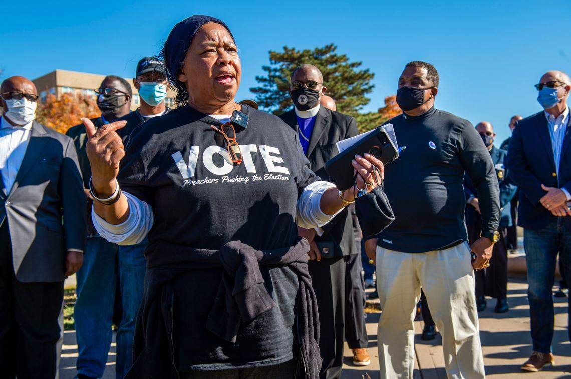Local clergy members including the Rev. Cassandra Wainright, left, of Concerned Clergy Coalition of Kansas City, gathered with members of the Kansas City Police Department Tuesday, Nov. 3, in Mill Creek Park for&nbsp;”Getting to the Heart of the Matter,”&nbsp;a prayer vigil to ask peace and calm on and after Election Day. 