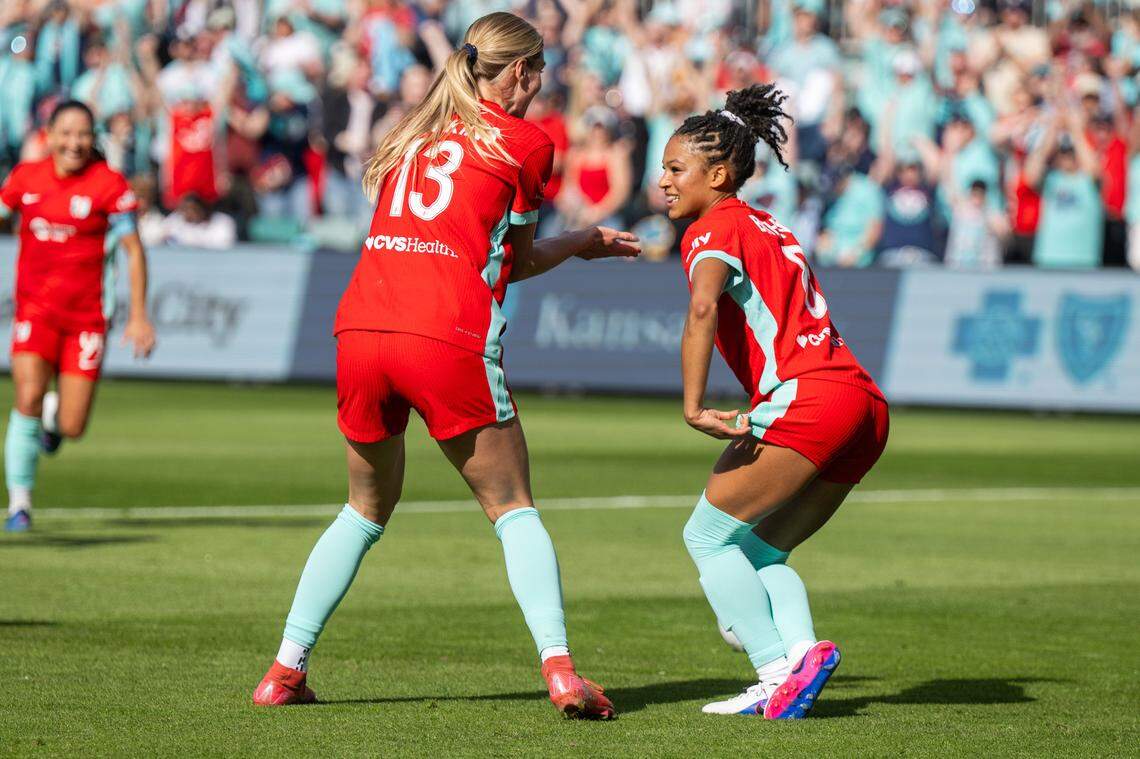 Kansas City Current midfielder Croix Bethune (8) curtsies after scoring a goal in the second half of the Current's match vs. the Utah Royals, on Saturday, March 14, 2026, at the CPKC Stadium. The Current won 2-1 against the Utah Royals.