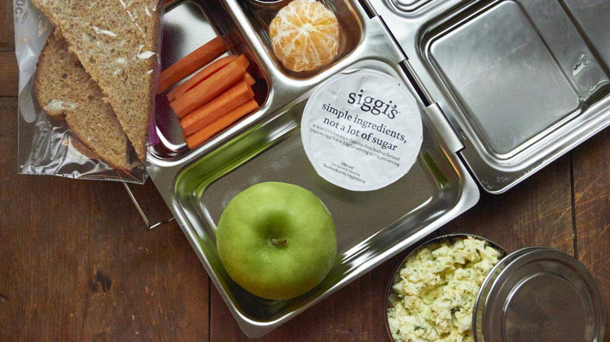 This 2015 image shows a vegetarian boxed school lunch with carrot sticks and fruit. (Katie Workman via AP)