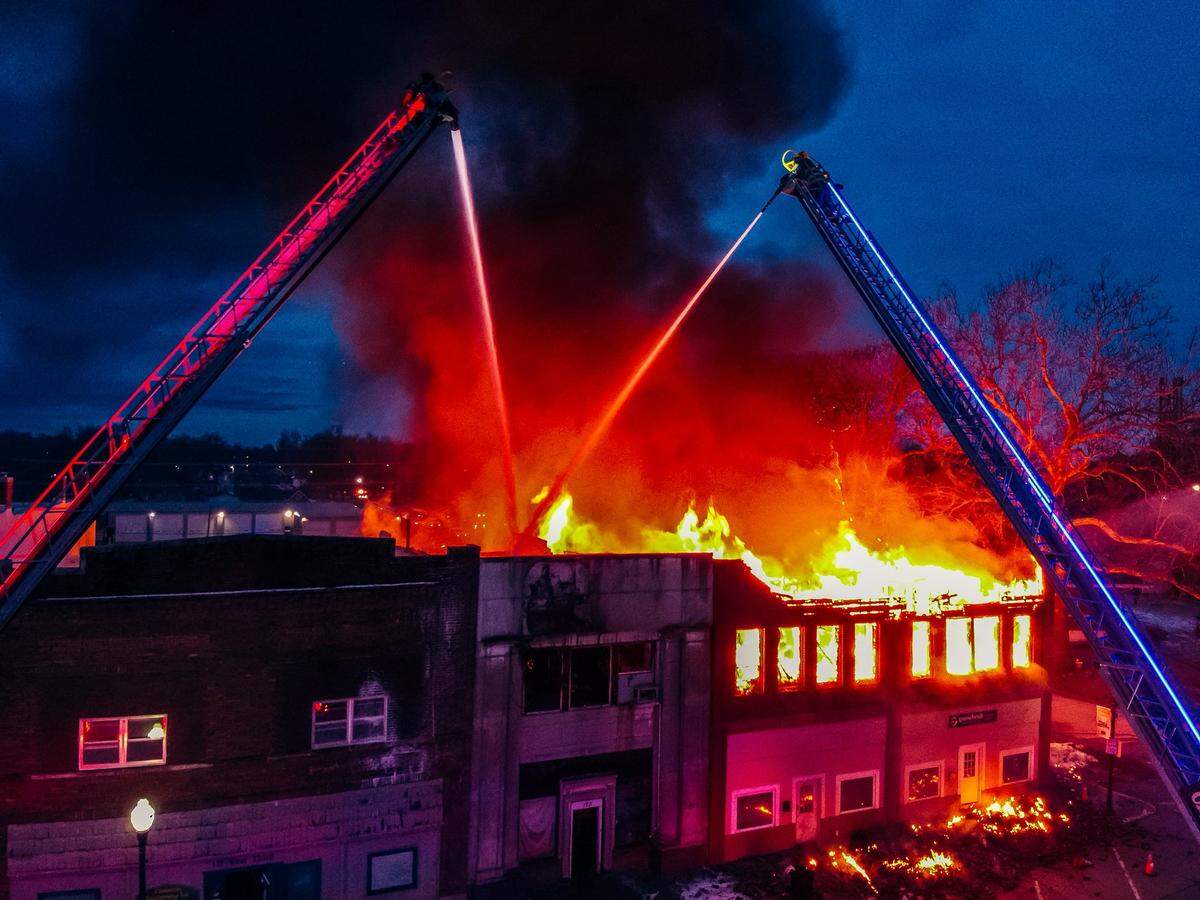 A massive fire destroyed multiple buildings that housed businesses and apartments Tuesday in downtown Cameron, Missouri. No one was injured or killed in the blaze, officials said.