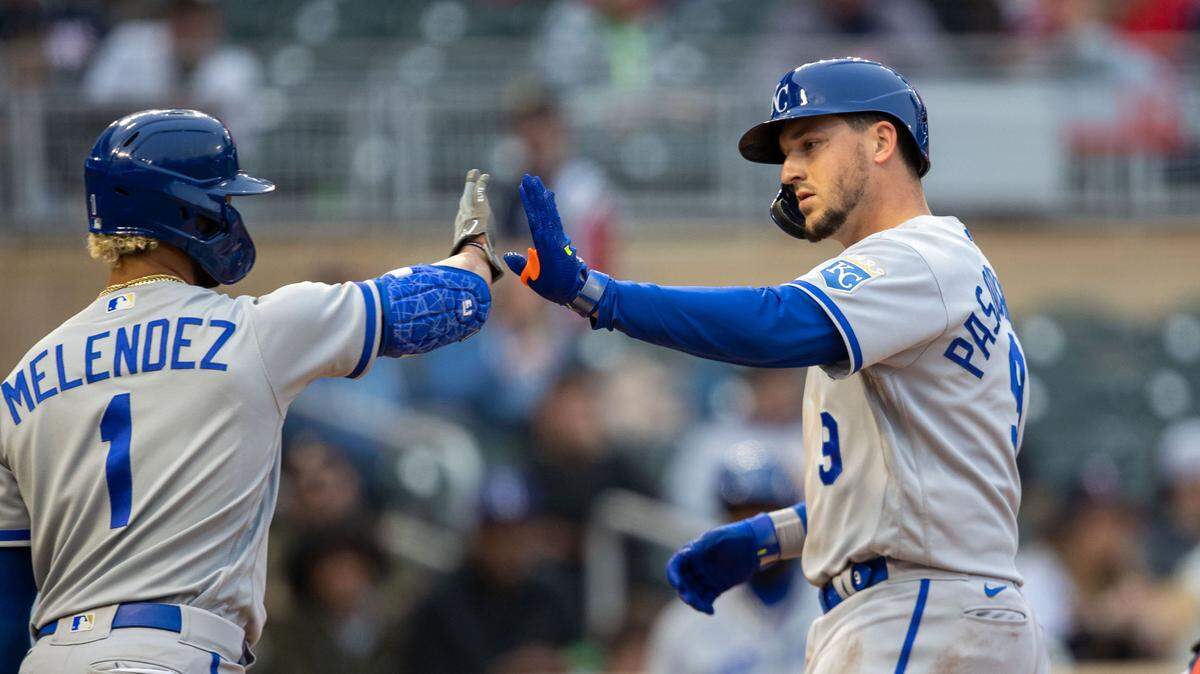 Royals first baseman Vinnie Pasquantino (9) celebrates with catcher MJ Melendez (1) after hitting a solo home run against the Twins at Target Field in Minneapolis on April 27, 2023.