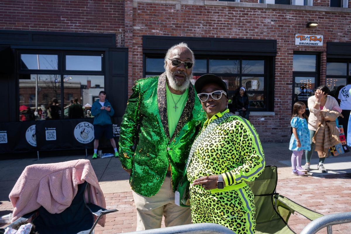 Joann and Tim Hughes watch the Kansas City St. Patrick’s Day Parade on Monday, March 17, 2025.