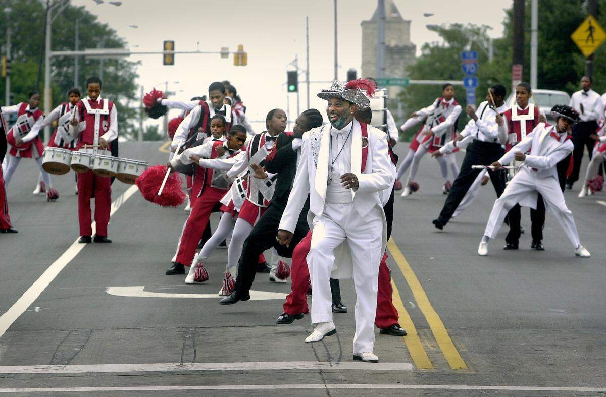 Willie Arthur Smith and the Cobras strut down Fifth Street in Kansas City, Kan., in 2003 during a parade.