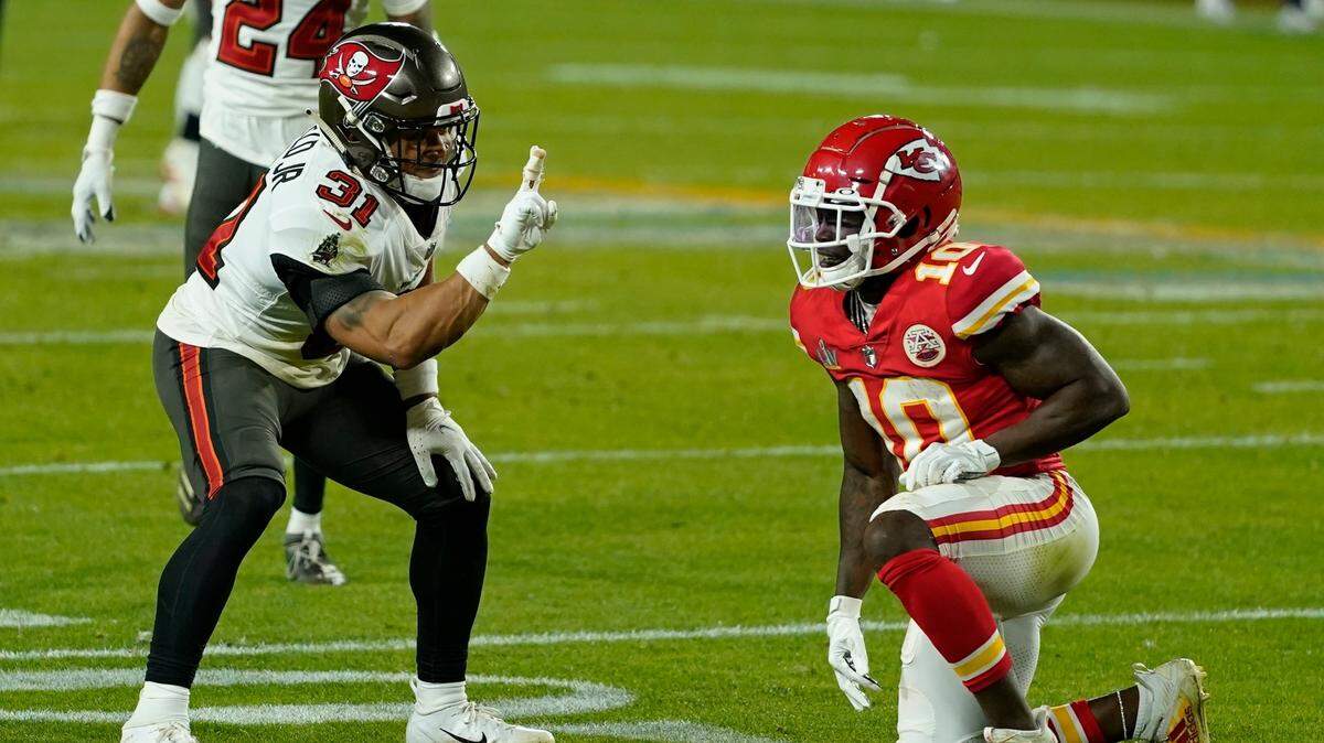 Tampa Bay Buccaneers strong safety Antoine Winfield Jr. taunts Kansas City Chiefs wide receiver Tyreek Hill after a play during the second half of the NFL Super Bowl 55 football game Sunday, Feb. 7, 2021, in Tampa, Fla. (AP Photo/Mark Humphrey)