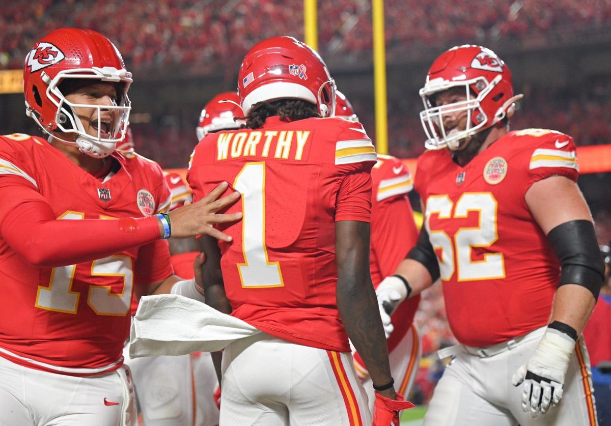 Kansas City Chiefs quarterback Patrick Mahomes congratulates wide receiver Xavier Worthy after Worthy ran in a touchdown in the first quarter against the Baltimore Ravens Thursday, Sept. 5, 2024, at GEHA Field at Arrowhead Stadium.