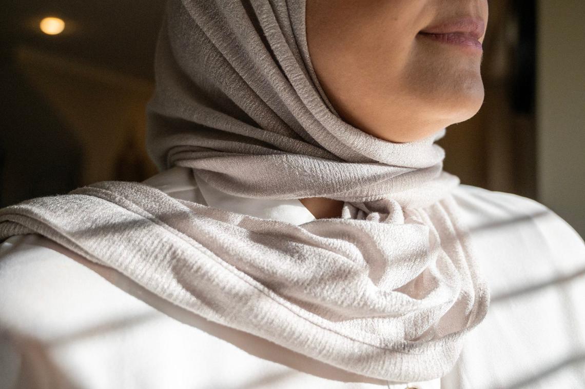 Hadil Alqarini poses for a portrait at her home on Tuesday, Sept. 17, in Kansas City. Alqarini shared her experience of being asked to leave a Worlds of Fun ride due to her hijab.