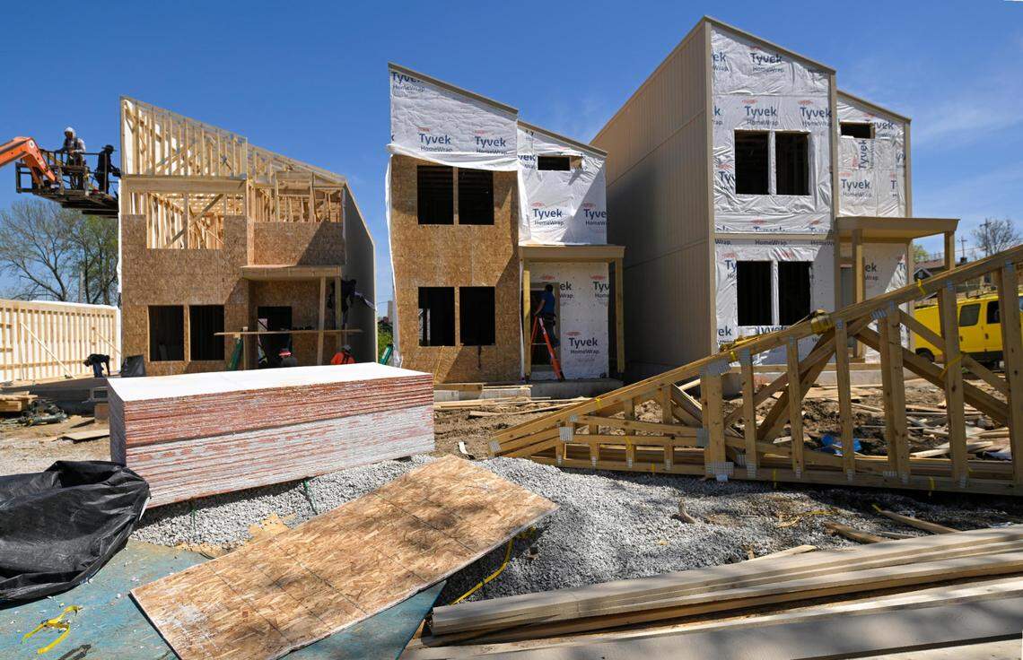 Three of seven new houses built by Lambie Homes, priced at about $494,000 each, rise on Mercier Street between 18th and 20th. Eight others, constructed by other home builders, are expected to go up within the year.