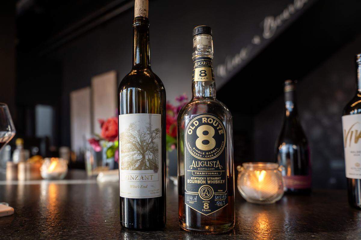 A bottle of Vinzant White End wine sits next to a bottle of Old Route 8 bourbon on the bar at Audrey's Wine + Bourbon on Thursday, Feb. 5, 2026, in the Waldo neighborhood of Kansas City.
