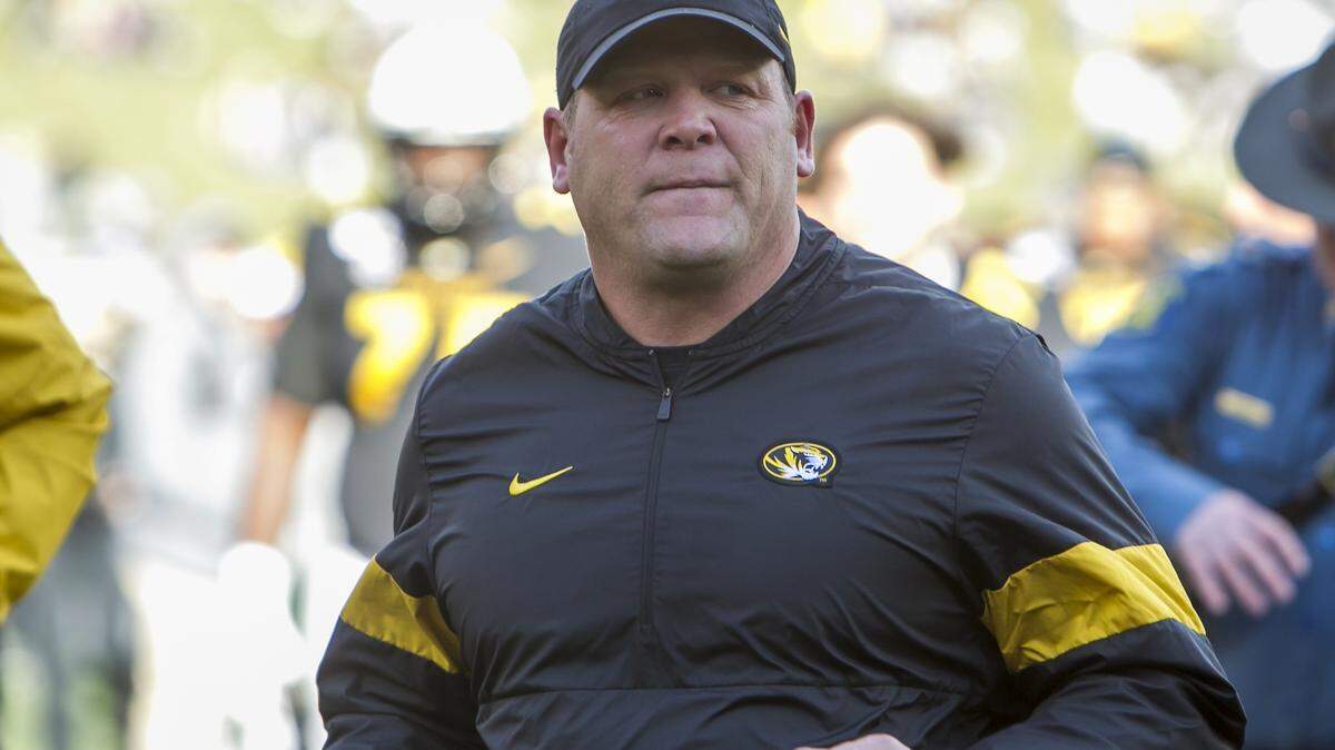 Missouri Tigers head coach Barry Odom jogs off of the field during the game between the Missouri Tigers and the Florida Gators on Saturday, November 16, 2019 at Memorial Stadium in Columbia, MO. Nick Tre. Smith/Special to the Star