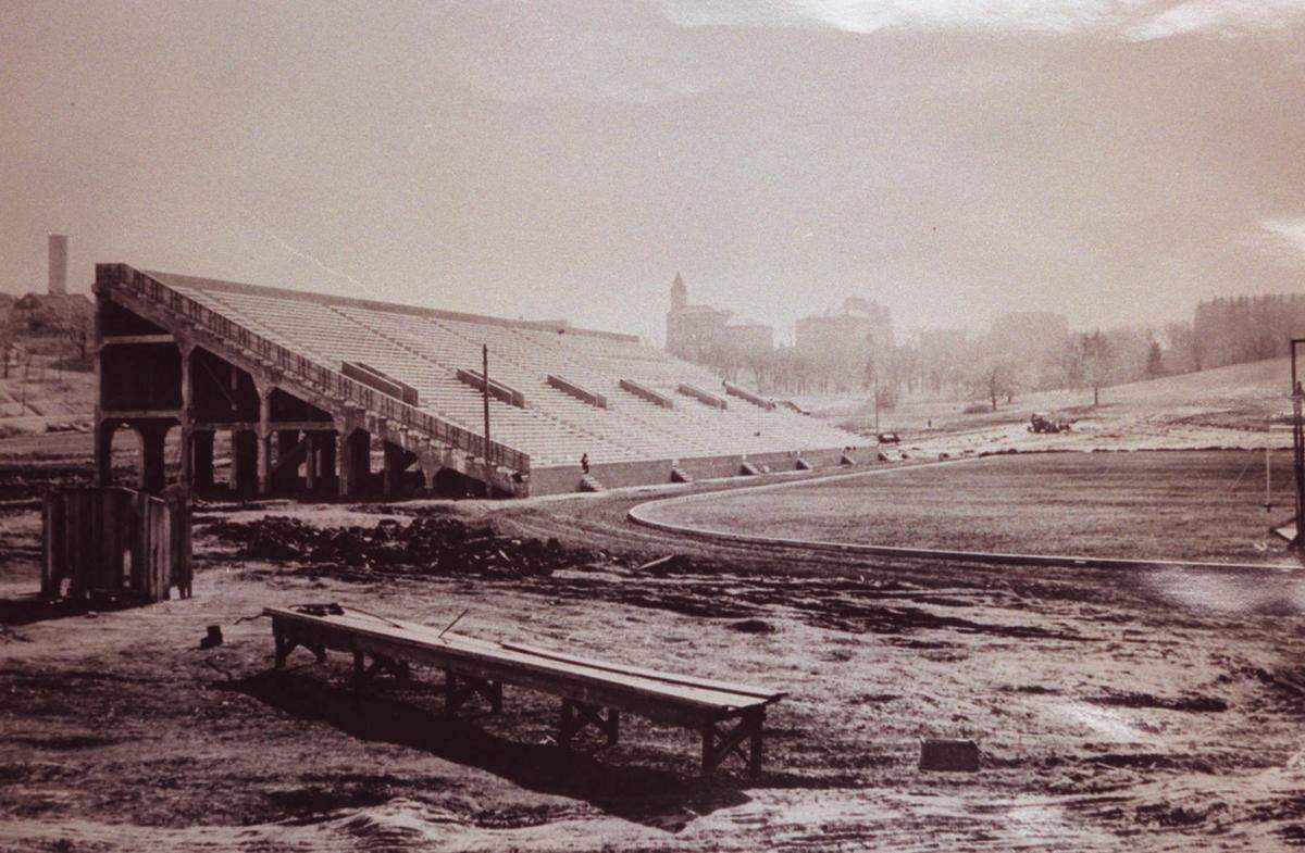 The east stands of Memorial Stadium seen under construction on the campus of the University of Kansas in 1921.