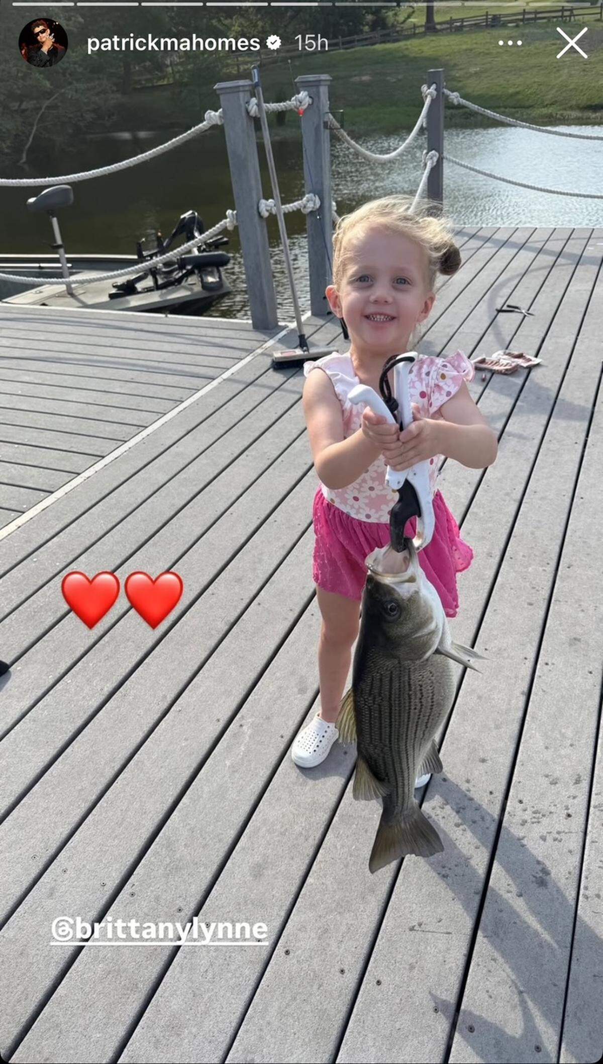 Sterling Mahomes, 4, poses with a fish.