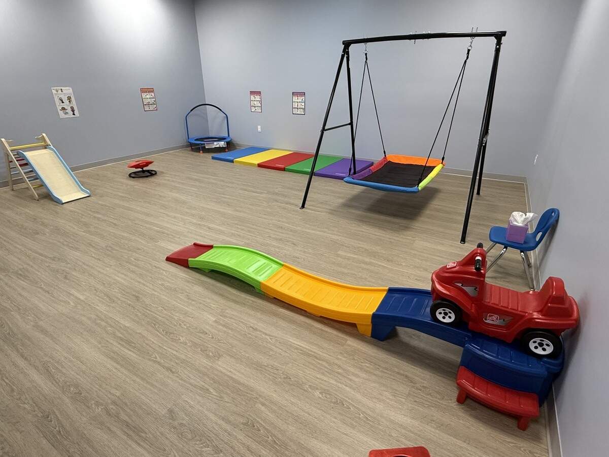 A room with toys designed to help children build motor skills is seen at Caravel Autism Health in Olathe.