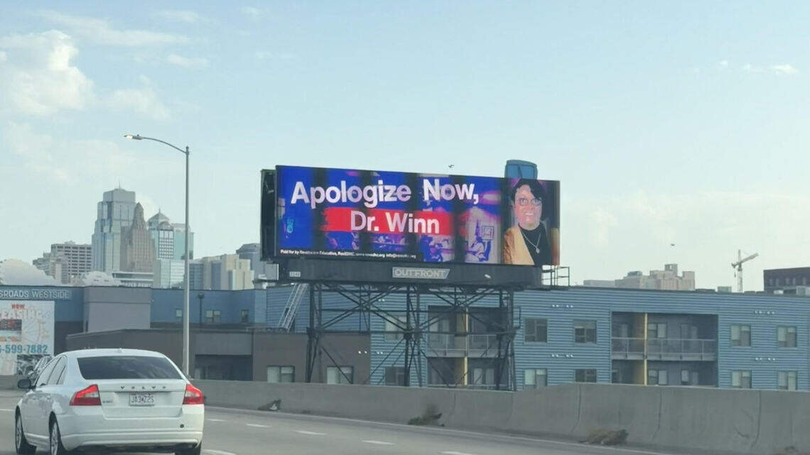 How a debate over spending ended with a KCK school official’s face on a billboard
