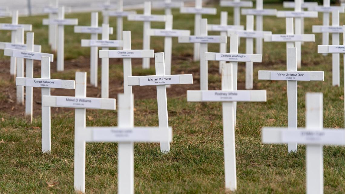 More than 170 crosses – individually marked with the names of a 2023 Kansas City homicide victim – dot the lawn outside of the Gathering Church on Wednesday, Dec. 20, 2023, in Independence, Missouri. A candlelight vigil and memorial service will be held at the church Thursday night to honor the year’s homicide victims.
