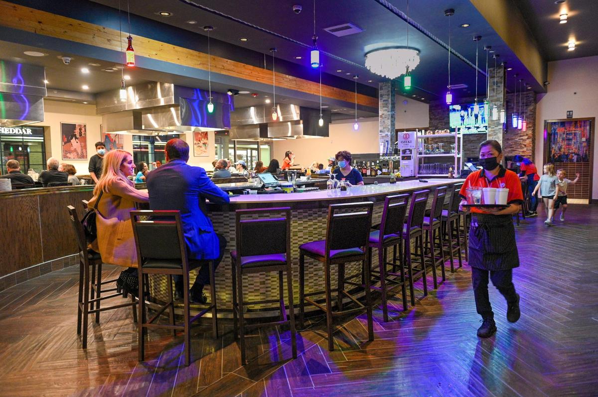 A horseshoe-shaped bar was a focal point at the old Standees restaurant and now at Shinju Sushi & Hibachi.