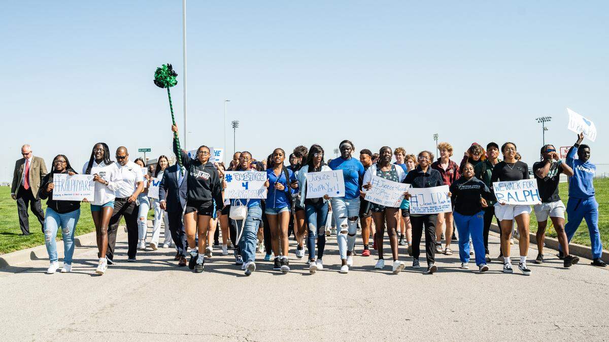 Student Landyn Goldberg photographed the crowd Tuesday at Staley High School’s Unity Walk, held in honor of classmate Ralph Yarl, 16, who was shot in the head while attempting to pick up his siblings.