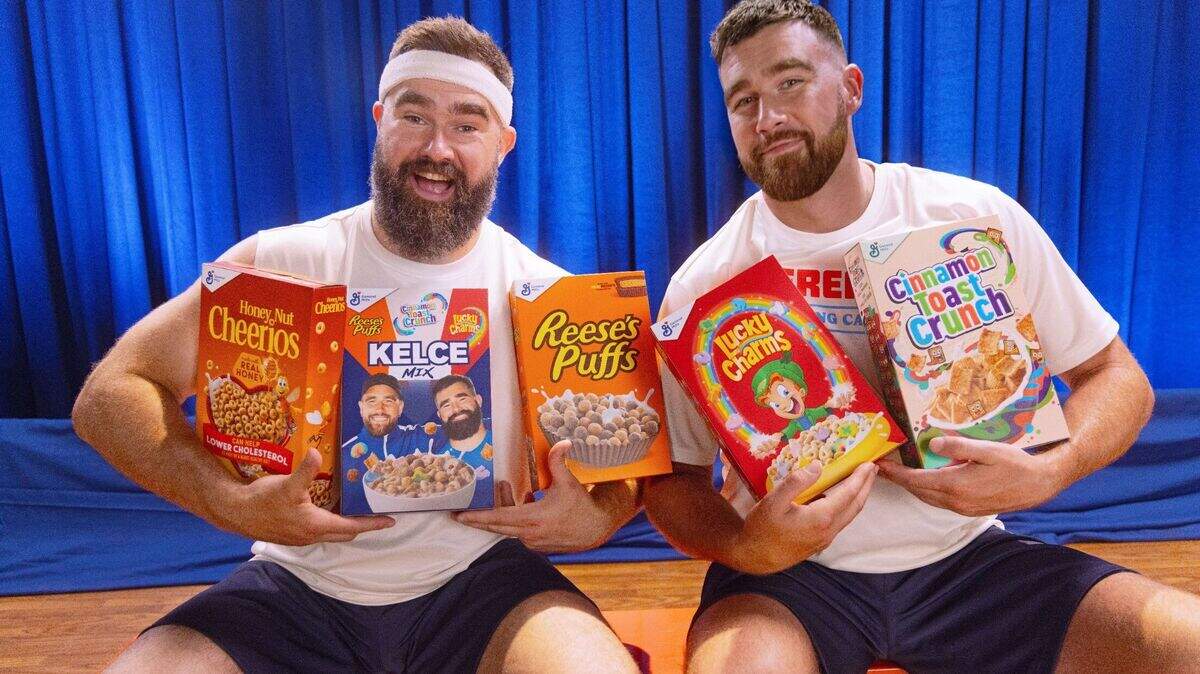 Jason Kelce (left) with brother Travis Kelce and some of their favorite cereals.