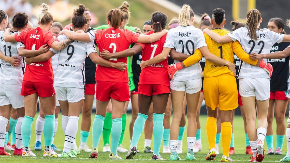 Members of KC NWSL and the Portland Thorns came together mid field as a sign of unity during the match between KC NWSL and the Portland Thorns on Sunday October 10, 2021 at Legends Field in Kansas City, Kansas.