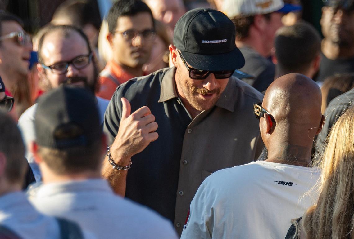 Travis Kelce greeted rapper Tech N9ne as he walked among fans and car enthusiasts who flocked to Kelce Car Jam in Kansas City on Saturday, October 5, 2024.