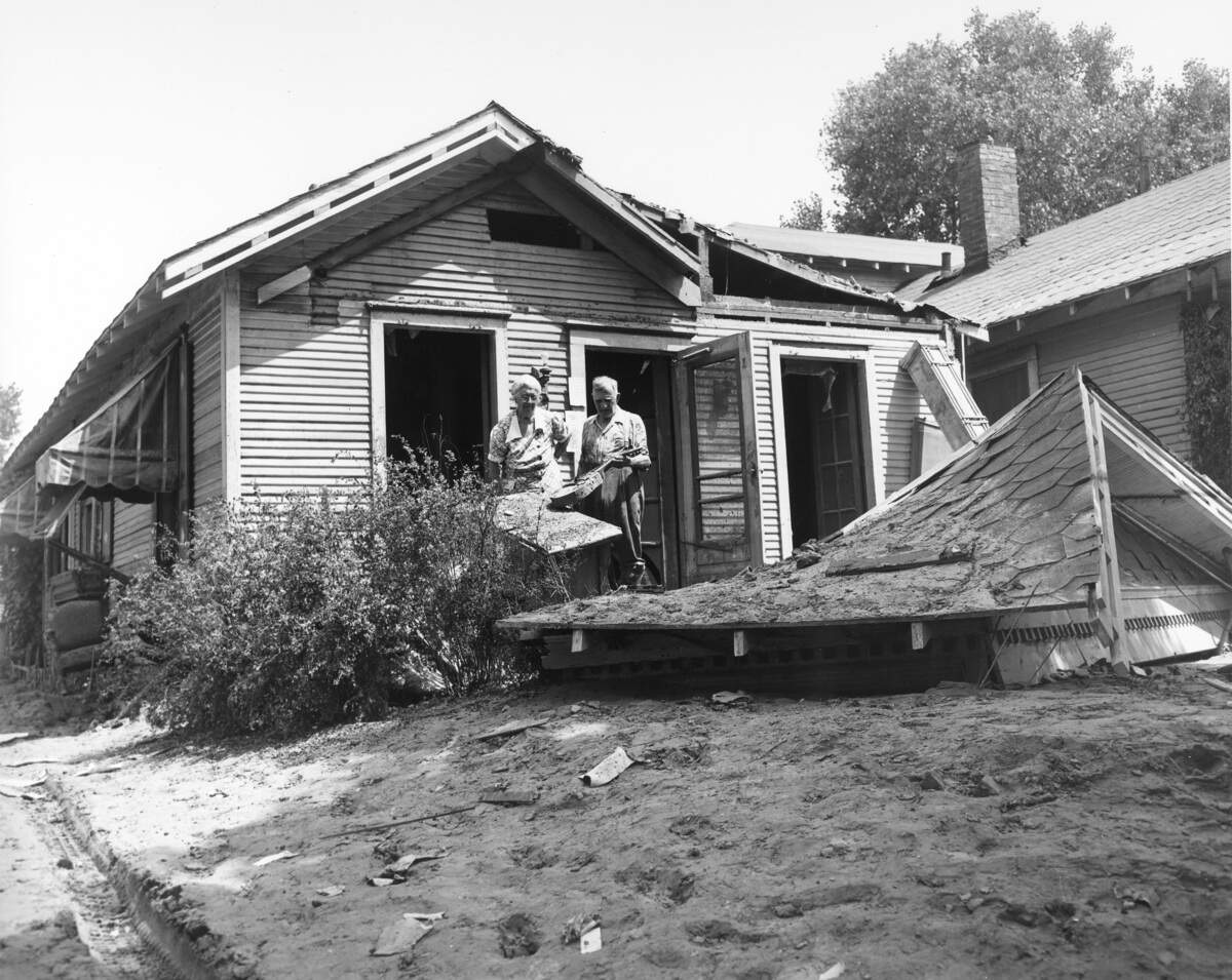 Survivors outside their damaged home in Armourdale, north of Argentine