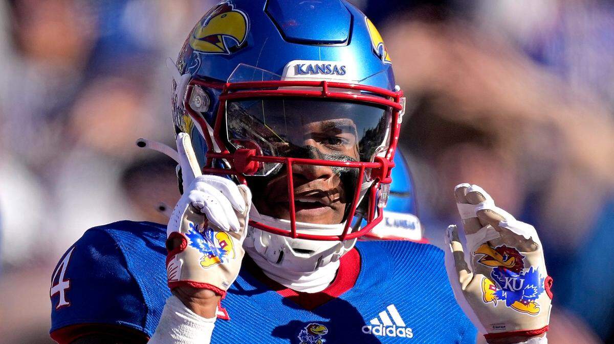 Kansas Jayhawks running back Devin Neal finished Saturday’s home game against Oklahoma State with more than 300 yards of combined offense, rushing and receiving.