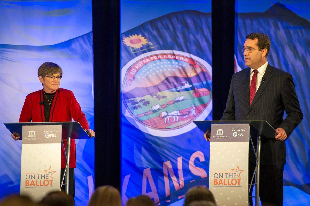 Democratic Gov. Laura Kelly and Republican nominee Derek Schmidt participate in a final debate for governor at the DoubleTree Hotel on Wednesday, Oct. 5, 2022, in Overland Park.