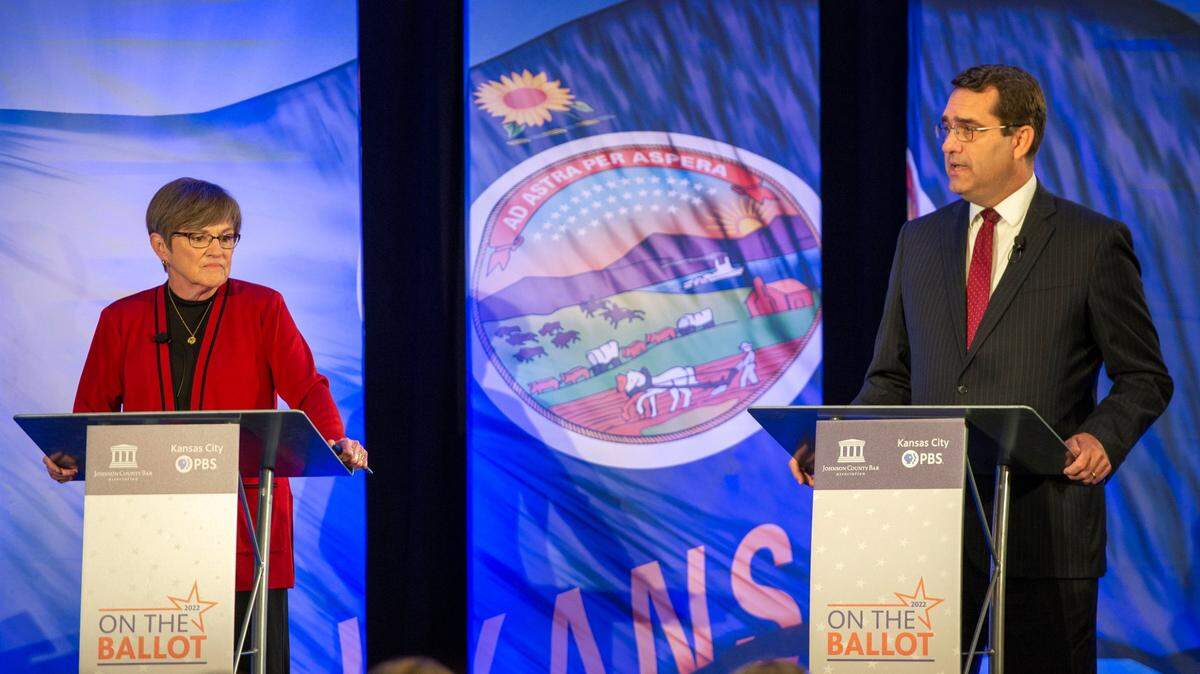 Democratic Gov. Laura Kelly and Kansas Attorney General and Republican candidate Derek Schmidt participate in a final debate for governor at the DoubleTree Hotel on Wednesday, Oct. 5, 2022, in Overland Park.