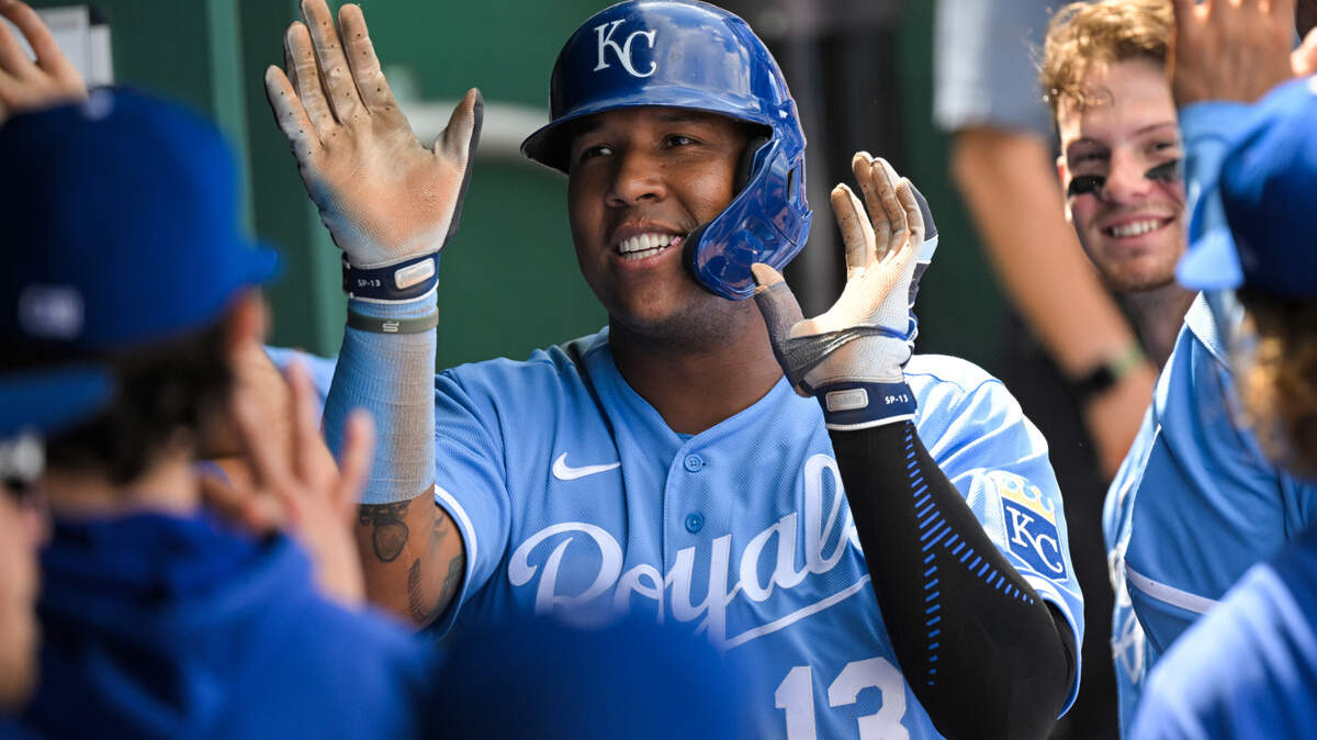 Kansas City Royals’ Salvador Perez celebrates with teammates after scoring during the sixth inning of a baseball game against the Toronto Blue Jays, Wednesday, June 8, 2022, in Kansas City, Mo. (AP Photo/Reed Hoffmann)