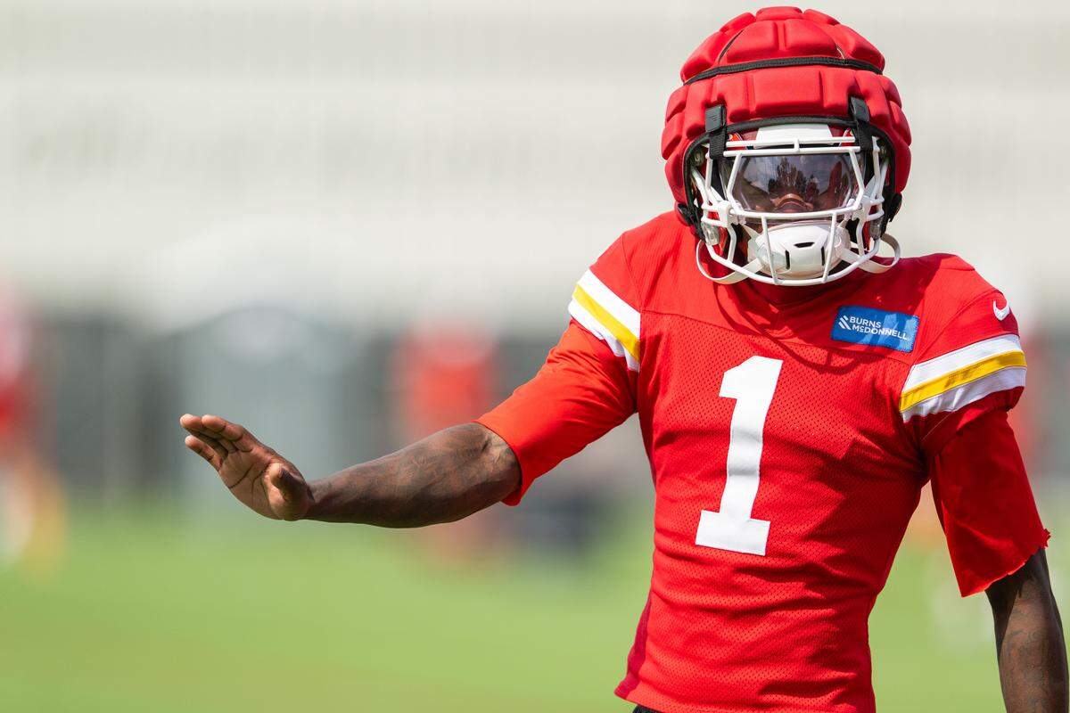 Chiefs wide receiver Xavier Worthy participates in during warm-ups at the team’s practice on Wednesday, Sept. 17, 2025, in Kansas City.