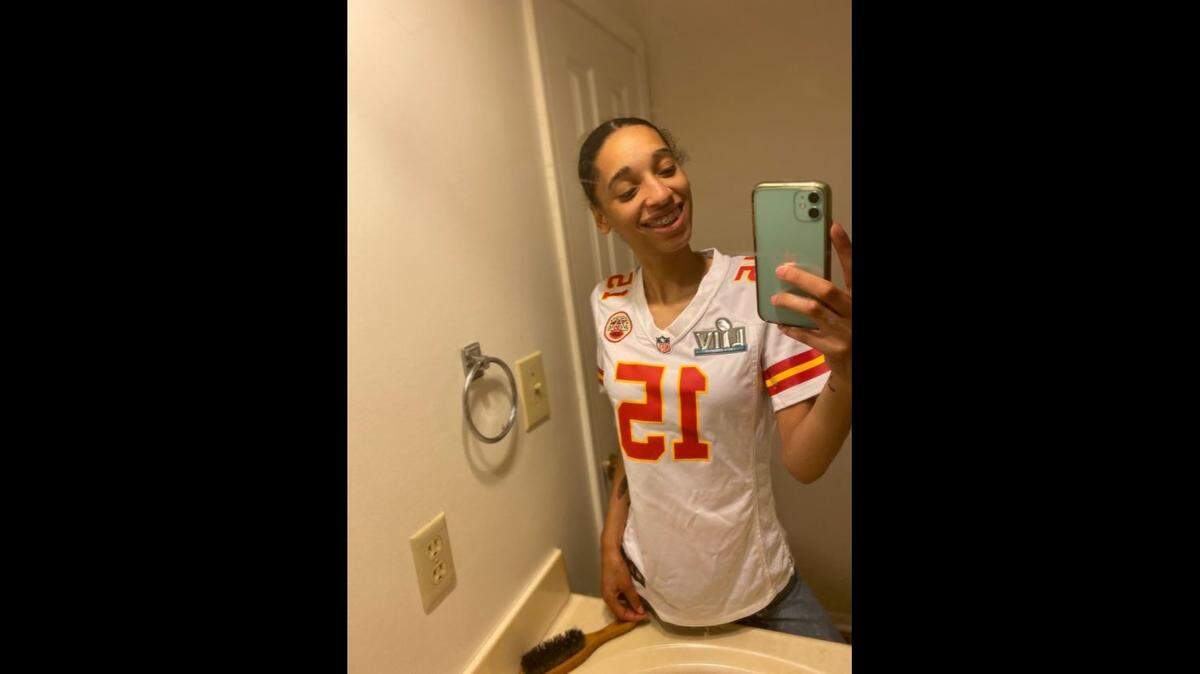 Jordae Ferguson, 22, was a resident of Waldo Heights Apartment, which caught fire Monday, Dec. 28, 2020. She is pictured wearing a beloved Patrick Mahomes jersey, which she lost in the fire.