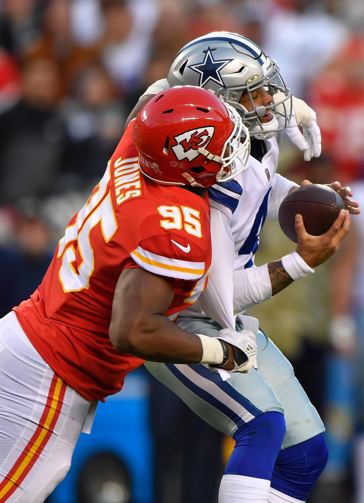 Kansas City Chiefs defensive end Chris Jones (95) sacks Dallas Cowboys quarterback Dak Prescott (4) during the second-half of the Dallas-Kansas City game on Sunday, Nov. 21, 2021 at Arrowhead Stadium in Kansas City.