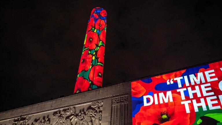 Poppies, a tribute to fallen soldiers, set Liberty Memorial aglow during NFL Draft