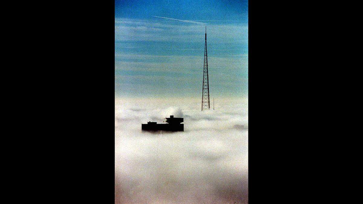 Looking southward from atop City Hall on the morning of Dec. 14, 1995, the then-Hyatt Regency Crown Center hotel and KCTV tower protruded above the fog.