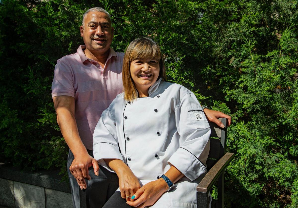 Penny and Doug Mufuka, outside their new Leawood restaurant, Bamboo Penny’s.