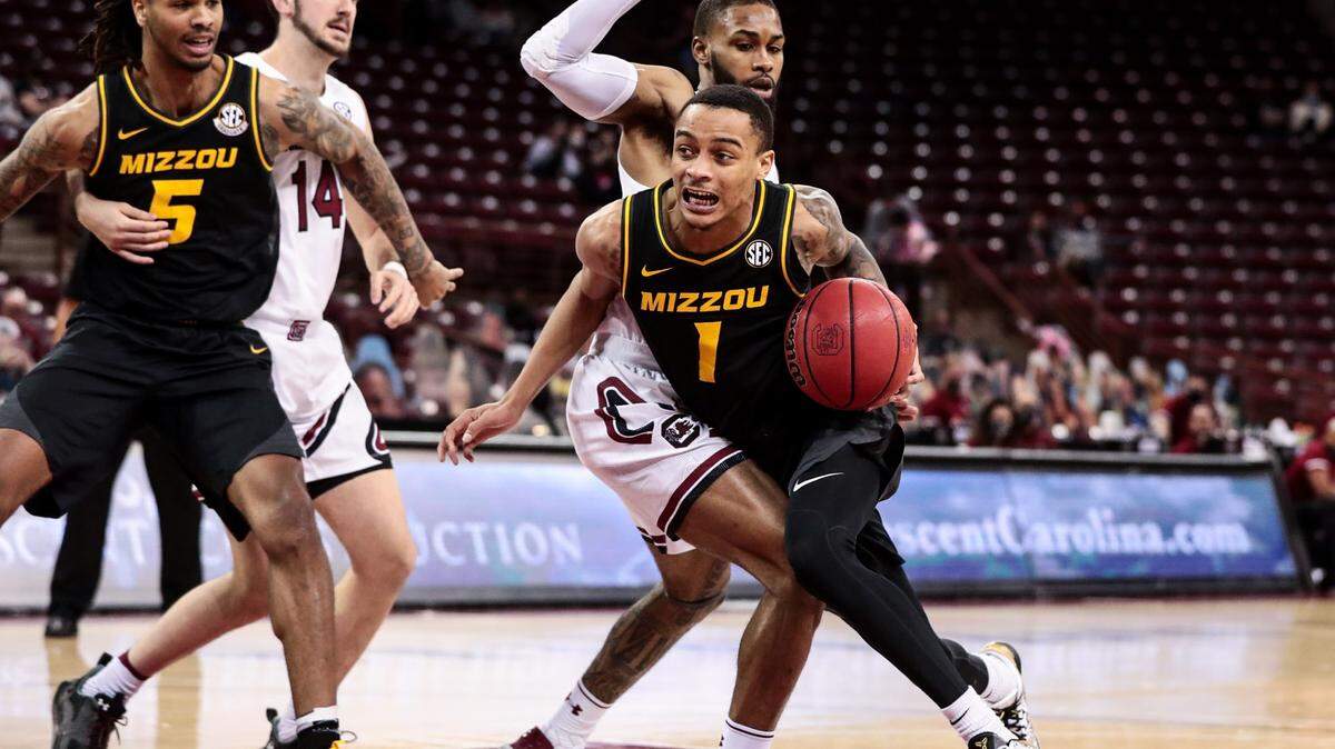 Mizzou guard Xavier Pinson (1) drove to the basket and finished with 17 points in the Tigers’ road victory over the South Carolina Gamecocks on Saturday, February 20, 2021.
