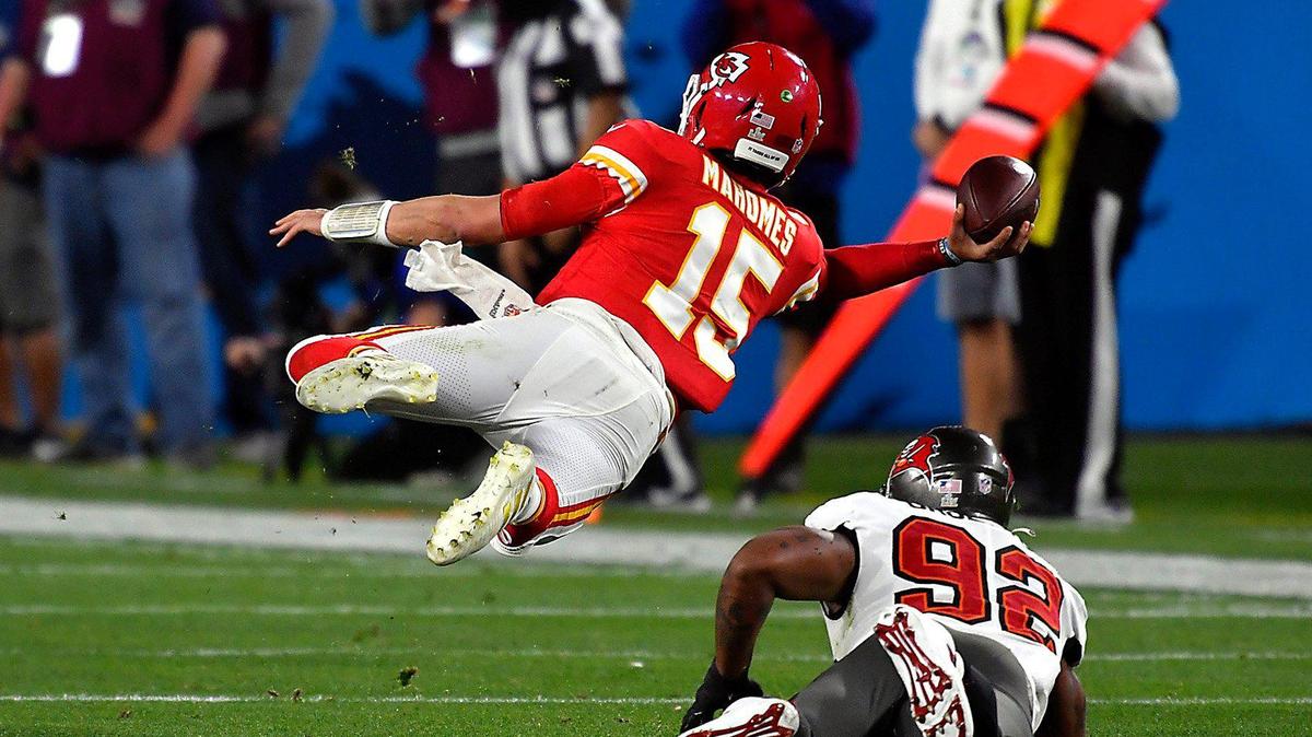 Chiefs quarterback Patrick Mahomes got tripped up by Bucs defensive end William Gholston but nevertheless managed to get off this pass during Sunday’s Super Bowl in Tampa, Fla. Intended for running back Darrel Williams, it fell incomplete.