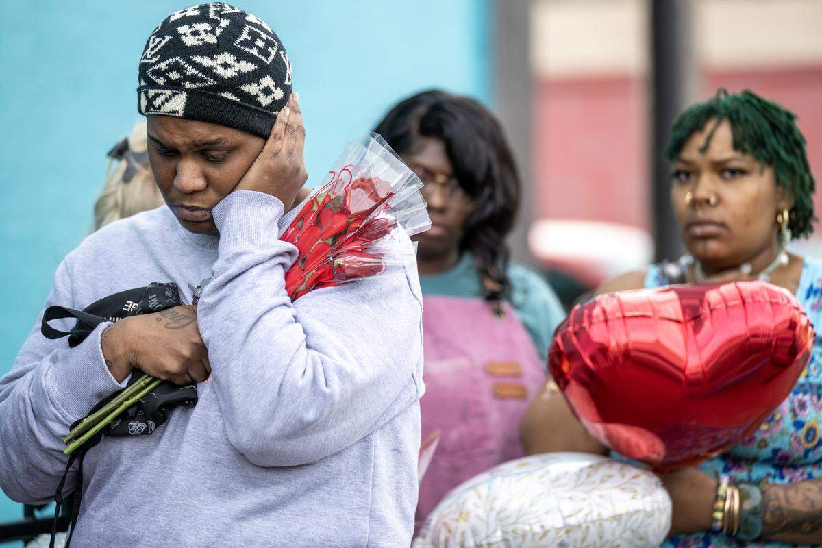One day after a nightclub shooting left two women dead, family and friends gathered for a memorial balloon release for victim Eboni Silas outside the nightclub, 2801 Southwest Blvd., on Monday, Feb. 16, 2026, in Kansas City. Authorities identified the victims as Eboni Silas, 29, Tishauna Ballard, 23.