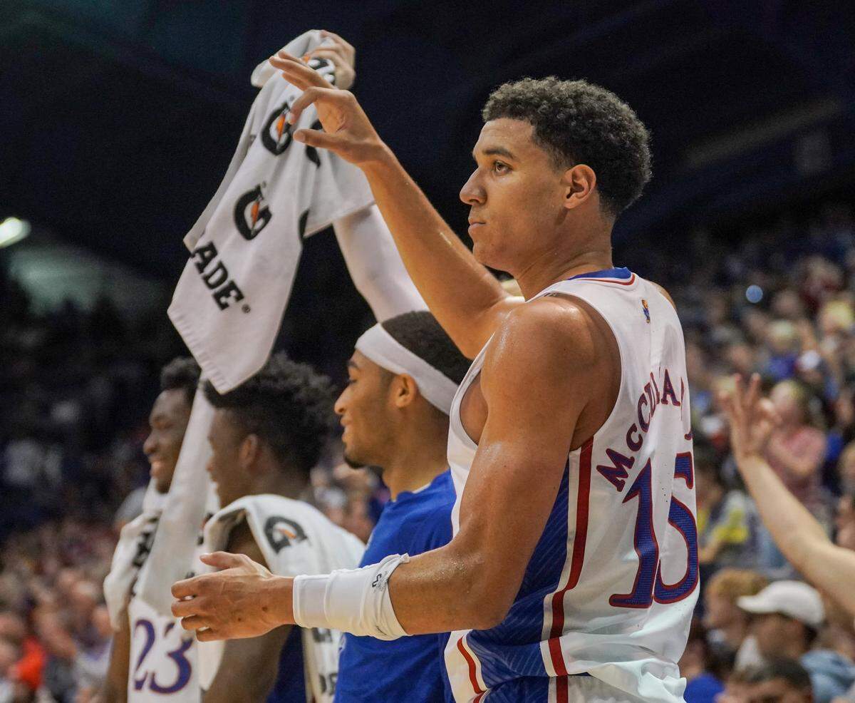 Kansas Jayhawks guard Kevin McCullar Jr. (15) celebrates with teammates after a score against Omaha at Allen Fieldhouse on Nov. 7, 2022.