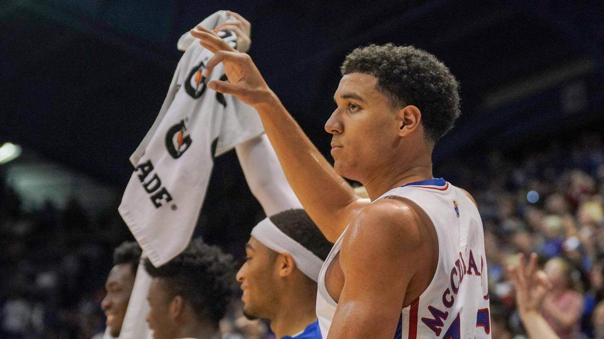 Kansas Jayhawks guard Kevin McCullar Jr. (15) celebrates with teammates after a score against Omaha at Allen Fieldhouse on Nov. 7, 2022.